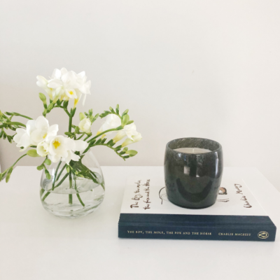 flowers, candles and books beating the January blues
