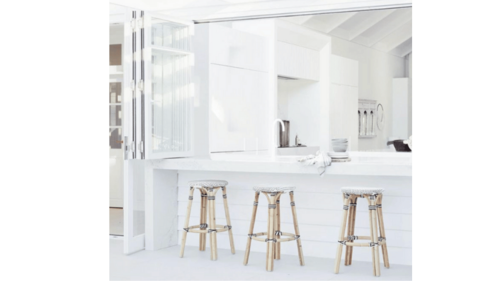 open window looking into kitchen - window sill double up as a bar space