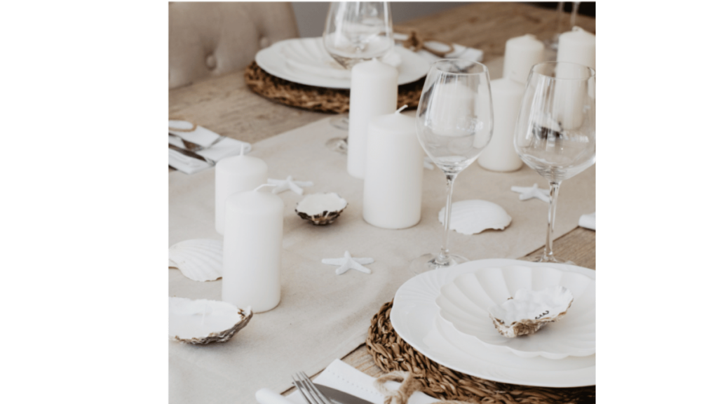 Table setting with shells for a coastal theme