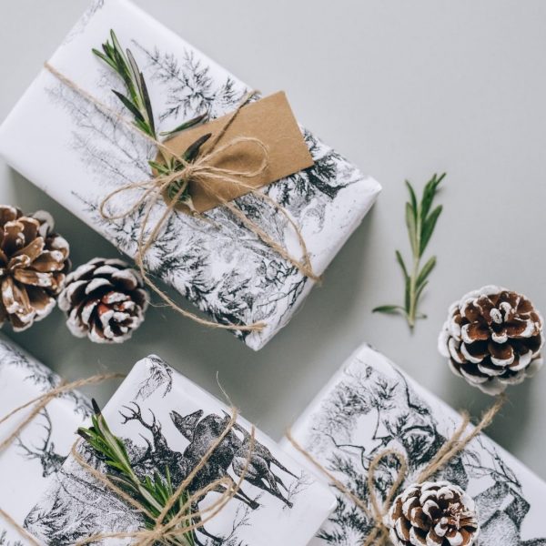 image of gifts wrapped with pine cones 